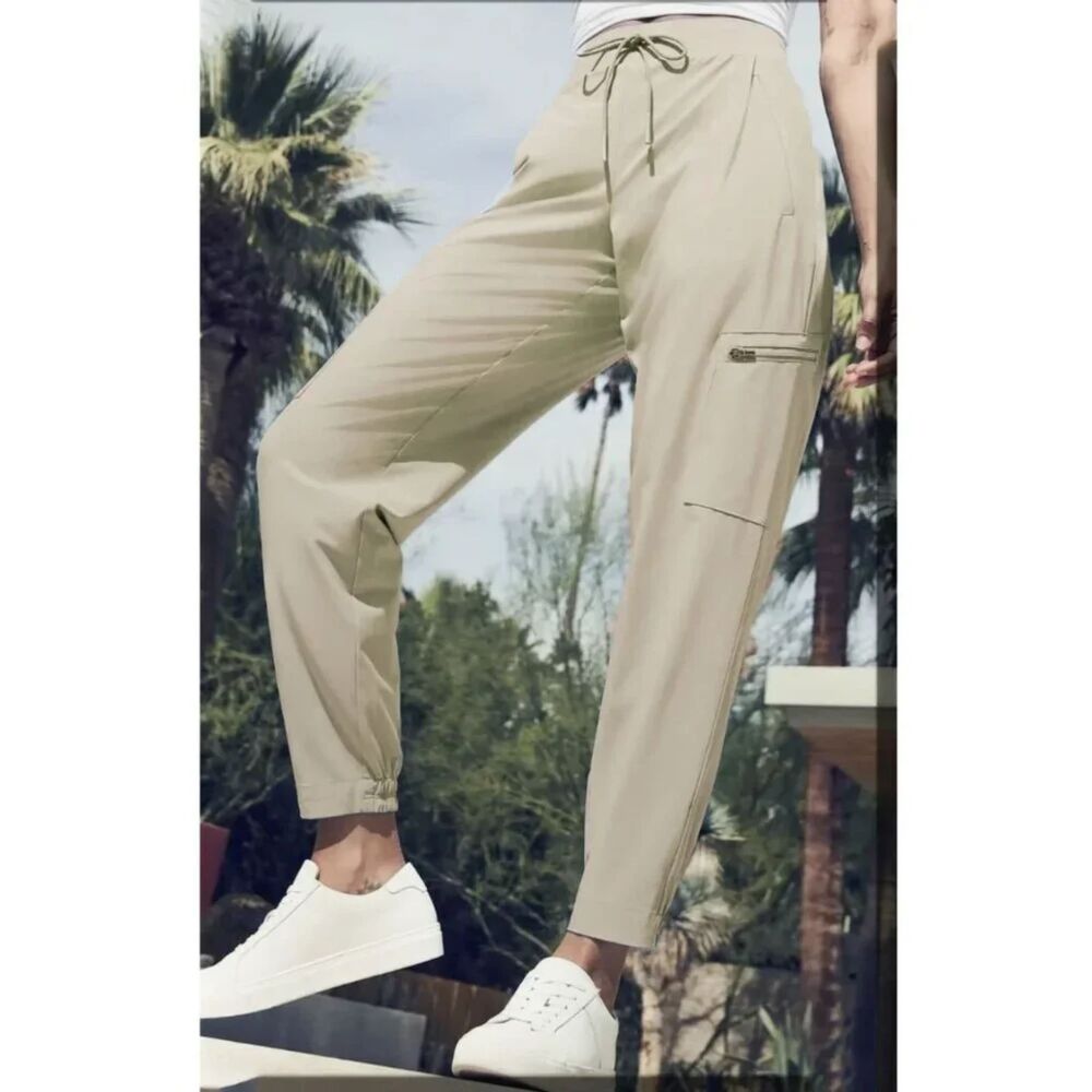 Athleta Venture Go Far Travel Jogger Pant Beige Tech Stretch Womens 2 Tan Taupe